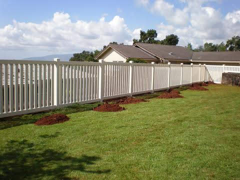 Tan vinyl closed picket fence