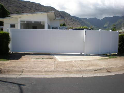 Tan vinyl fence installation